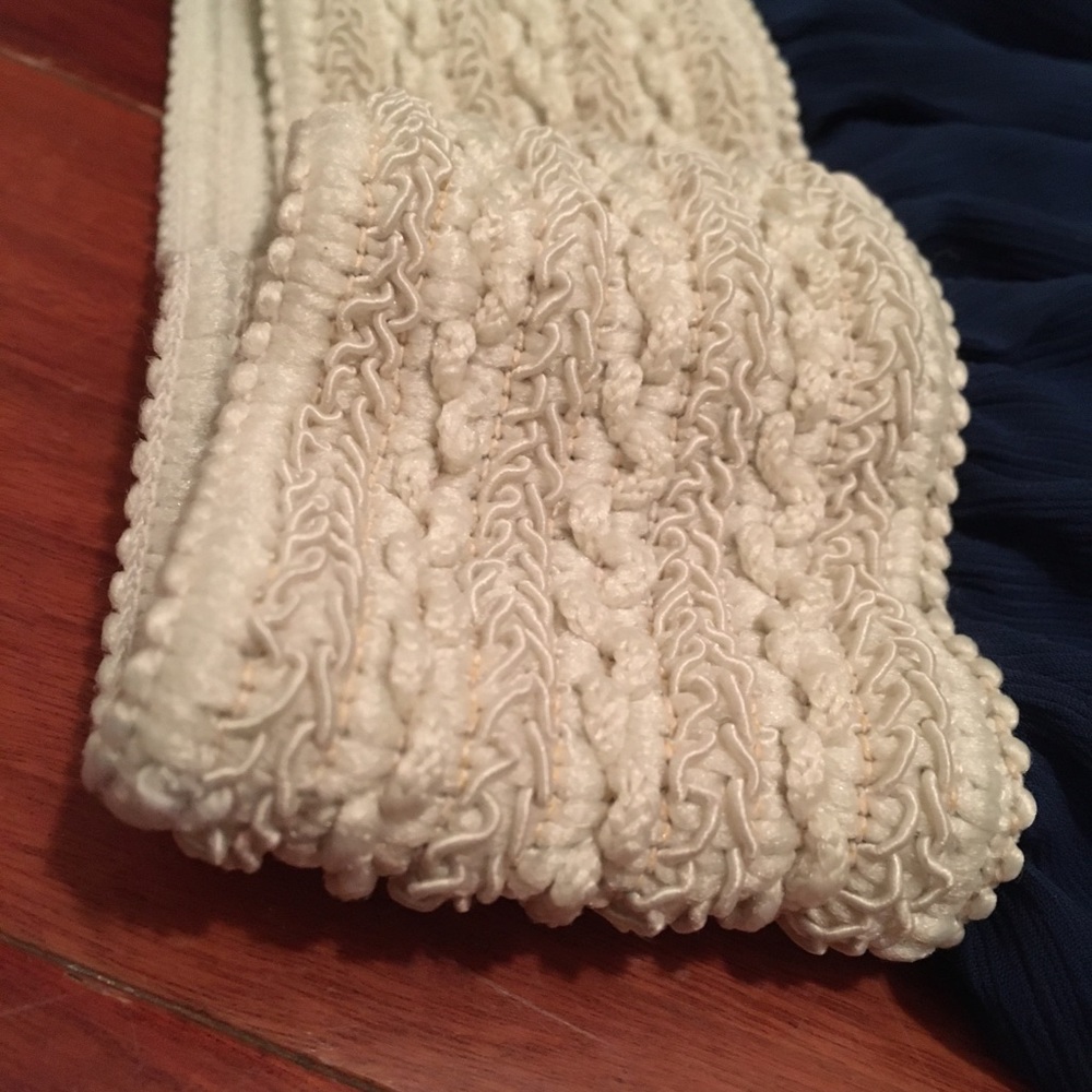 Girls navy blue skirt. Short hemline (in front)